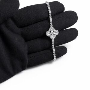 Swarovski Silver-Tone Crystal Bracelet with Clover Accent